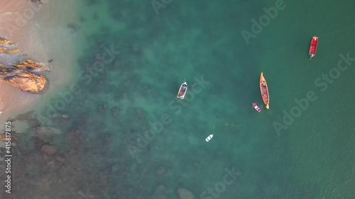 High angle  veiw of rowing boats on sea by drone