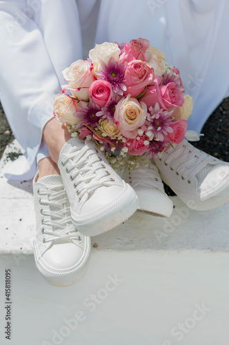 casual lesbian wedding, shoes and flower bouquet