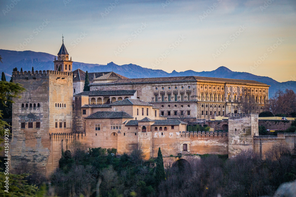 View on the Alhambra palaces complex from Mirador San Nicolas in thr Albaicin district of Granada (Andalusia, Spain)