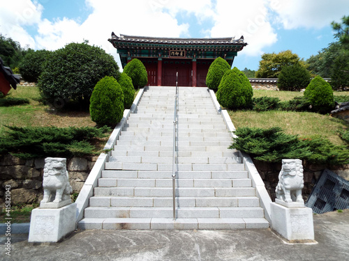 Gimhae, South Korea, September 3, 2017: Access stairs of the Mileug-Am Buddhist temple. Gimhae, South Korea photo