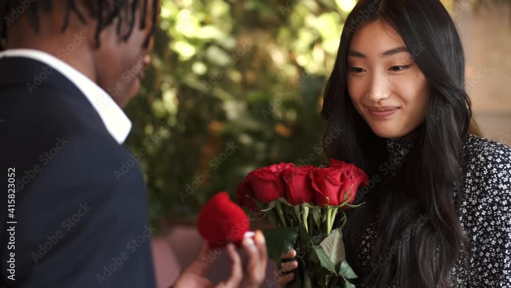 girl getting flowers to her lover on their date girl getting flowers to her lover on their date