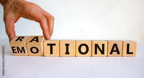 Rational or emotional symbol. Psychologist turns wooden cubes and changed the word 'rational' to 'emotional'. Beautiful white background. Psychological and rational or emotional concept. Copy space. photo