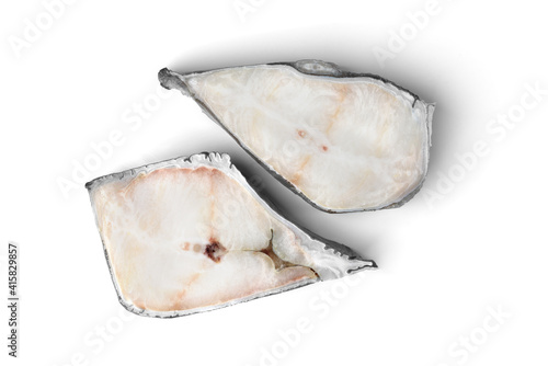Frozen raw fish steak isolated on white background.