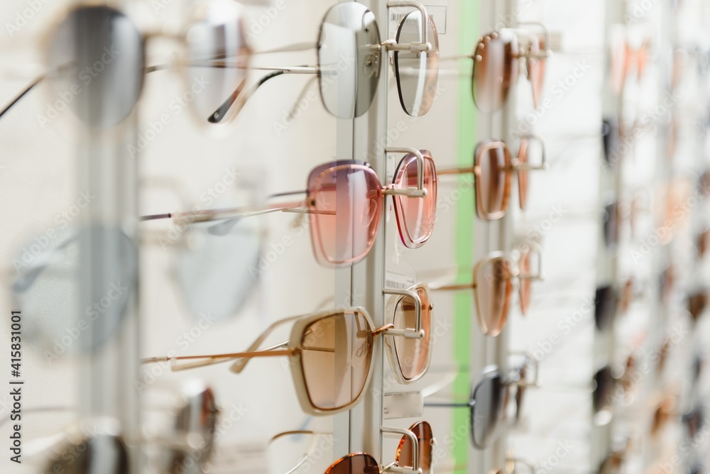 fashionable sunglasses on the shop shelf