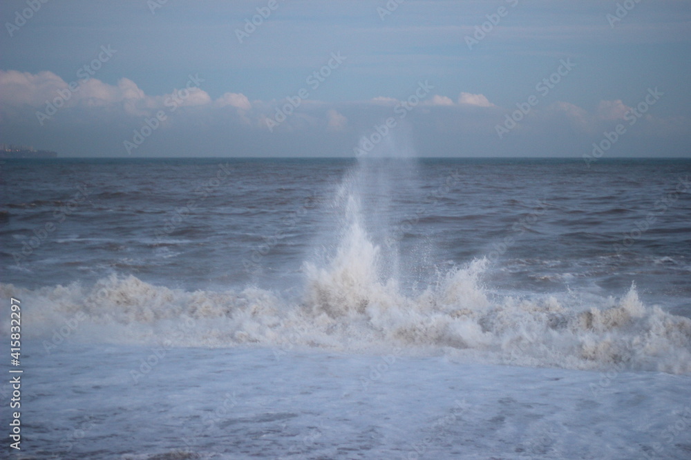 waves crashing on the beach