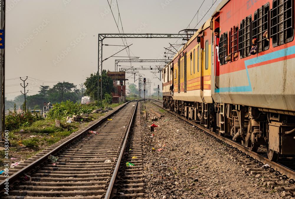 Fototapeta premium Train at track with passengers on board from different angels