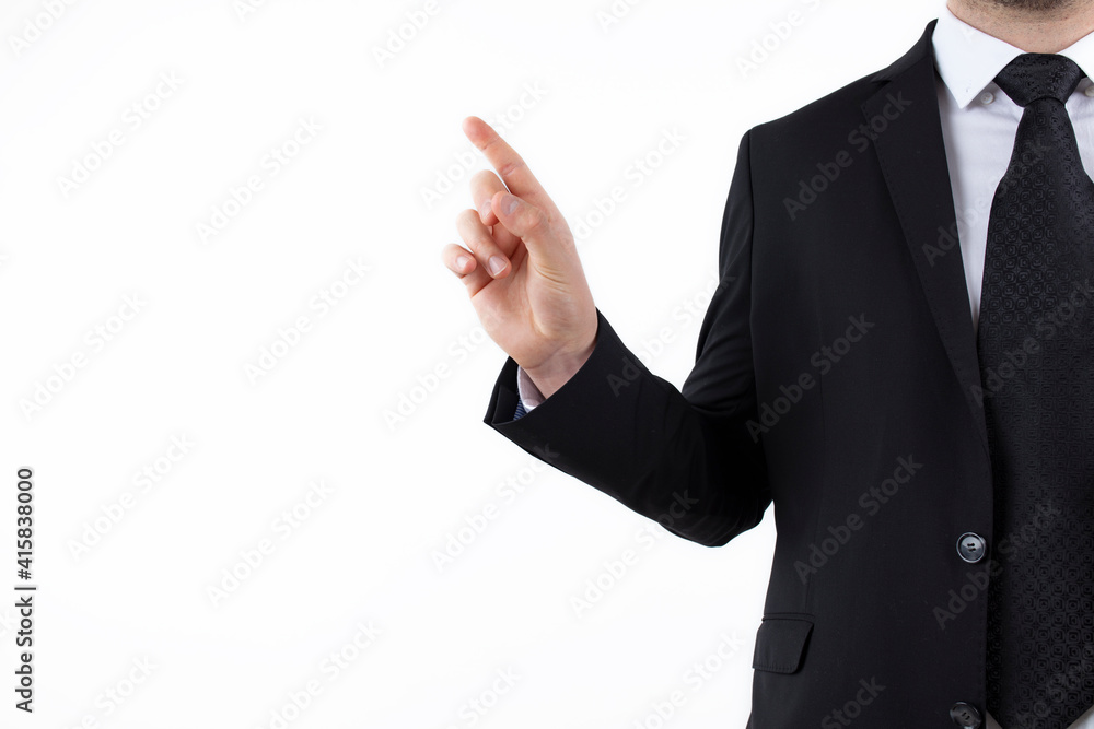 young successful businessman. Market broker man on white background, wearing suit with tie and pointing at a copy space with his finger.
young successful businessman. Market broker man on white background, wearing suit with tie and pointing at a copy space with his finger.