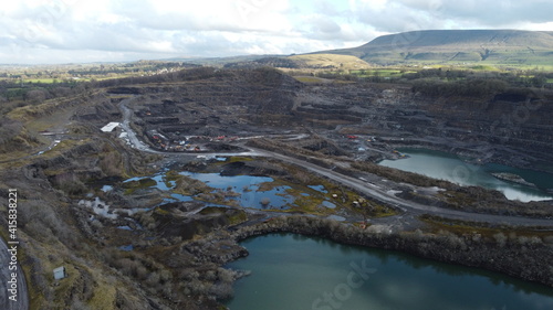 Large limestone quarry in Clitheroe, Ribble valley. Deep excavation quarrying for rocks