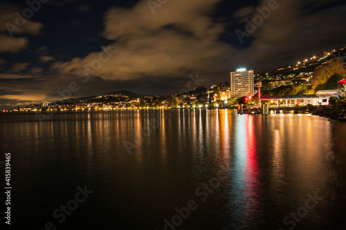 A long exposure view on Lac Leman lake reflections in Montreux town in Switzerland 