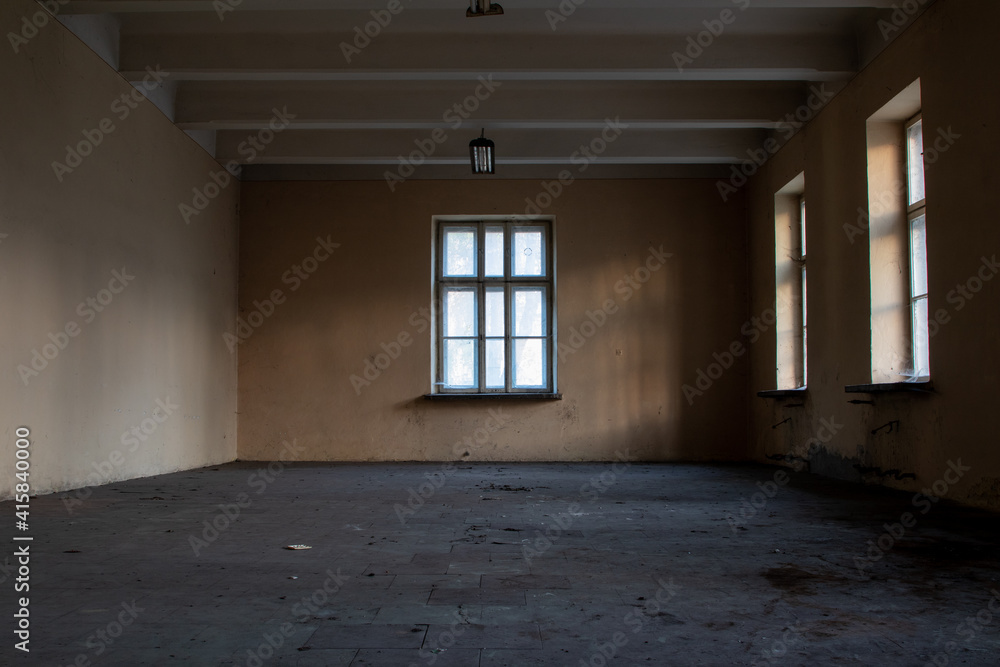 room with window in abandoned building