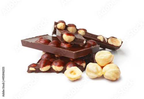 Black broken chocolate with hazelnuts