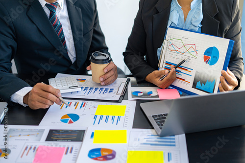 Foto Hands of business people working in the office with documents That represents th
