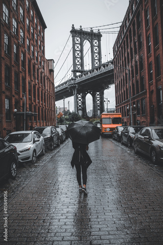 Photography Usa,New York,Brooklyn,October 2016, on a rainy day, a girl walks towards the Man