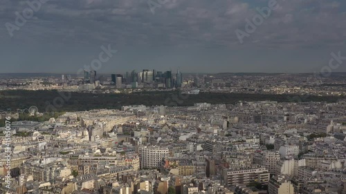 sunny clouds sky paris cityscape modern downtown district aerial panorama 4k france photo