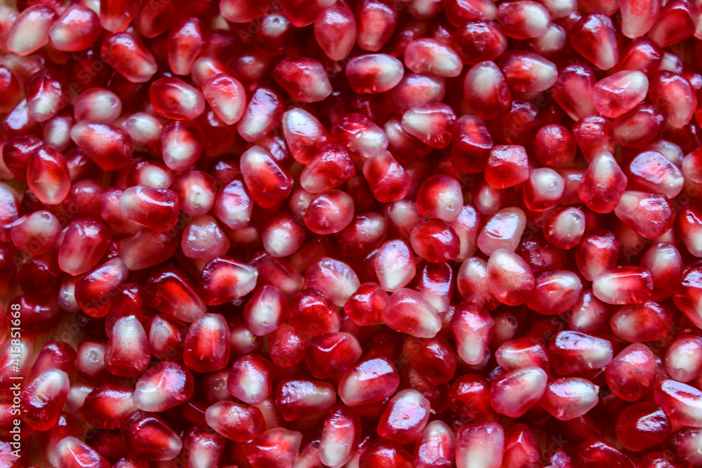 Pomegranate seeds. Macro. Close up. Red pomegranate seeds.