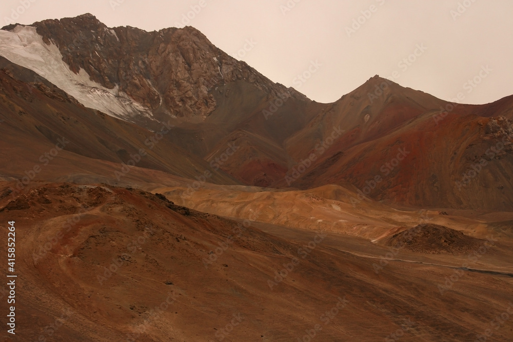 Obraz premium Spectacular view on snow-capped mountains in Gorno-Badakshan, the Pamir region of Tajikistan. Snow covered peaks of Pamir mountains