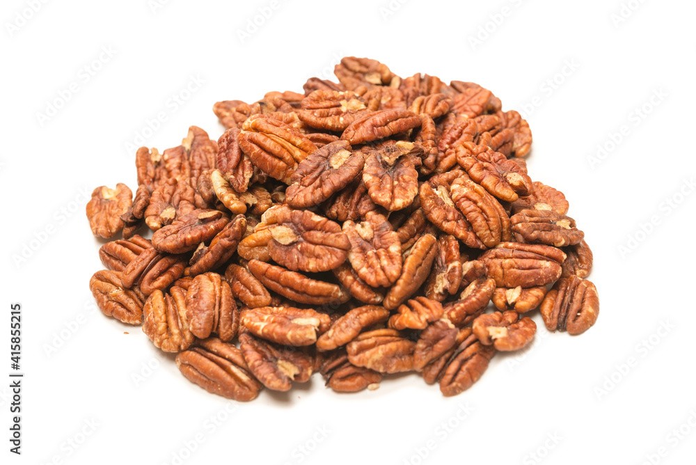 Pecan-nut isolated on white background. Top view. Pecan-nut isolated on white background. Top view.