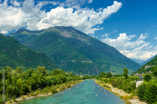 The Adda river along the Sentiero della Valtellina at summer