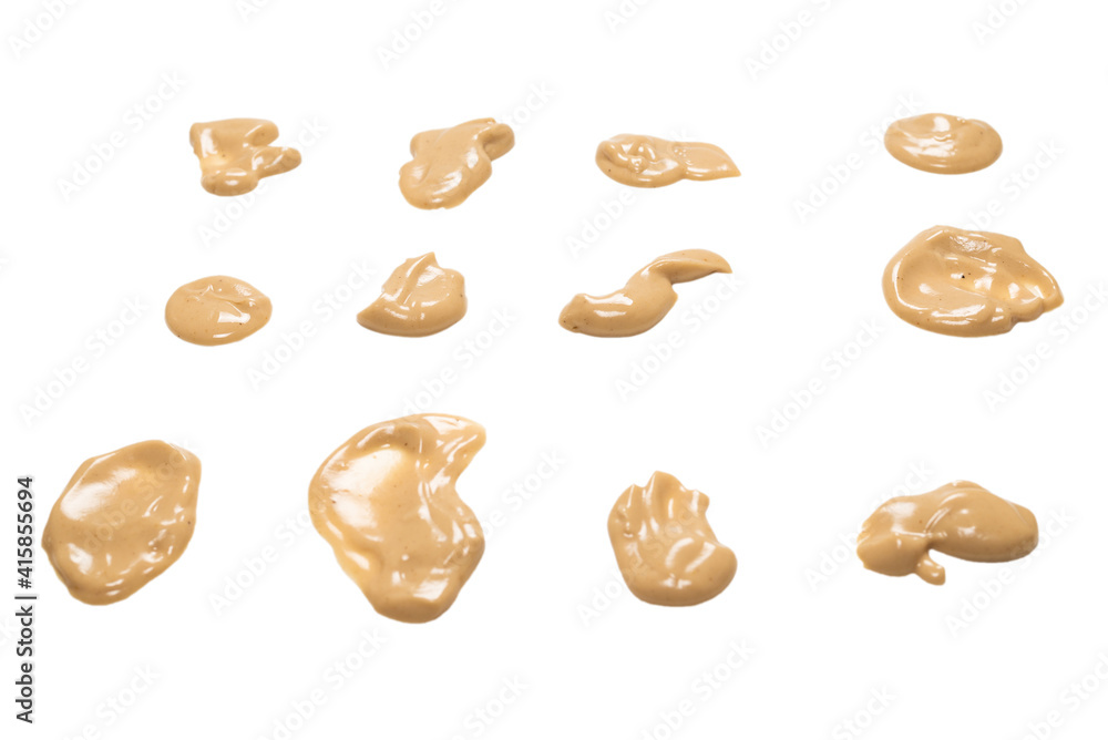 Mushroom sauce splashes isolated on white background. Mushroom sauce splashes isolated on white background.