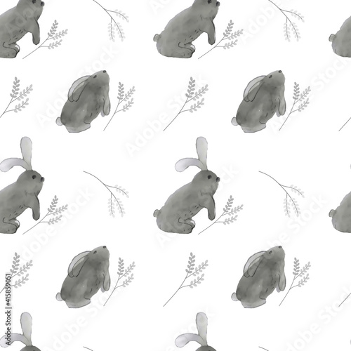 Cute rabbit with Easter pussy willow branch on a white background.