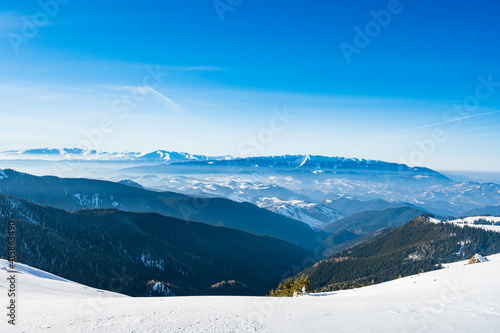 Obraz na płótnie Piatra Craiului mountain range in Romania in winter w salonie