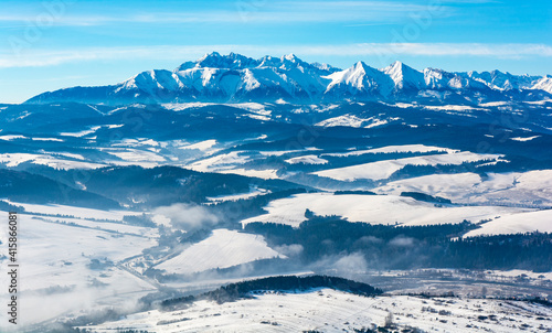 View of the Tatra Mountains in winter colors from the Pieniny Mountains. © gubernat