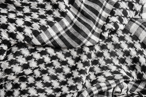 Saudi men s national headdress called Ghutrah. Traditional tissue black and white arabic man's head scarf Shemagh (Keffiyeh). Close up textile background.