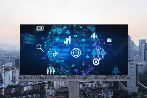 World planet Earth map hologram of social media icons over sunset panoramic cityscape of Kuala Lumpur, Malaysia, Asia. The concept of people connections in KL. Globe