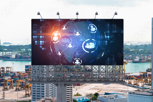 World planet Earth map hologram and social media icons on billboard over panorama city view of Singapore, Southeast Asia. The concept of people networking and connections.