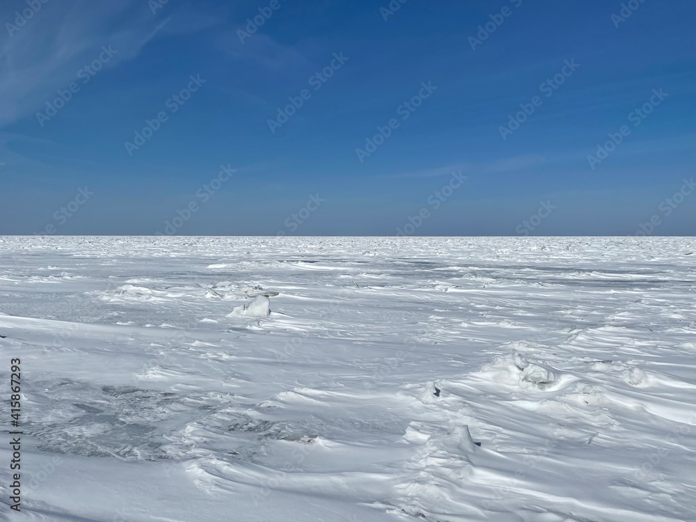 frozen landscape over the lake frozen landscape over the lake