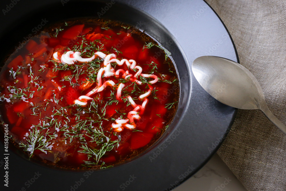 Russian traditional dish borscht on the kitchen table Russian traditional dish borscht on the kitchen table