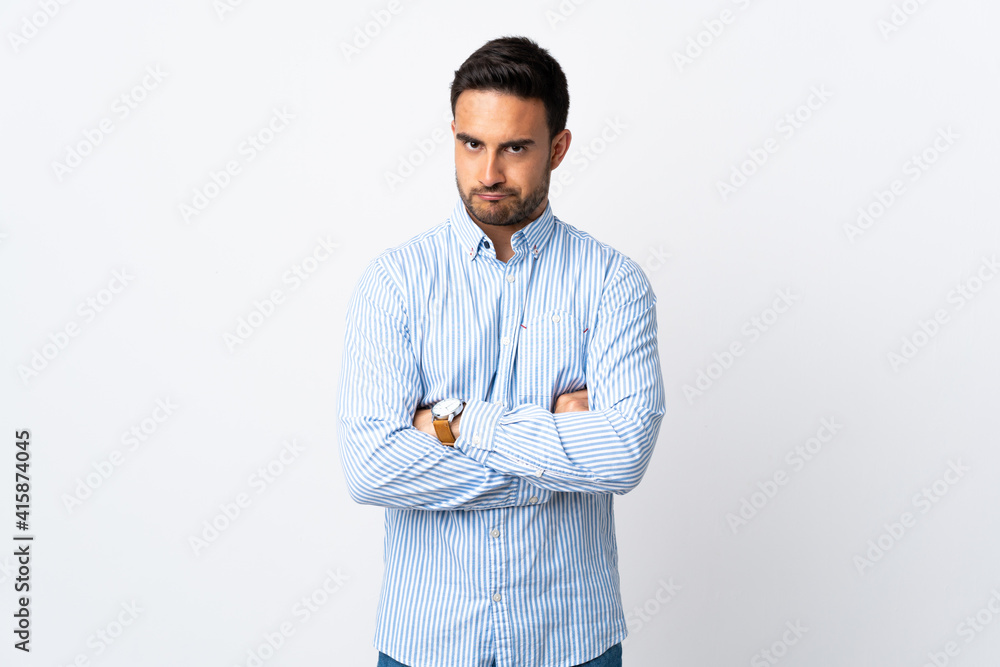 Young handsome man over isolated background with unhappy expression Young handsome man over isolated background with unhappy expression