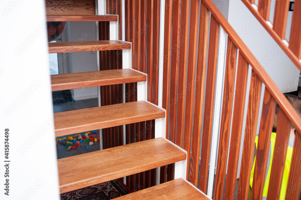 Wooden handrails with stairs in the interior Wooden handrails with stairs in the interior