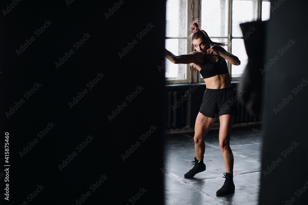 Young girl doing sports in the gym. Atmospheric gym Young girl doing sports in the gym. Atmospheric gym
