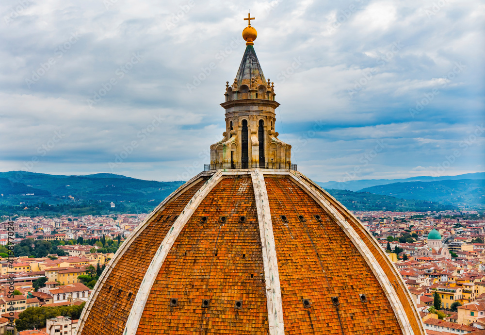 Dome with golden cross, Florence Cathedral, Florence, Italy. Finished 1400's. Formal name Cathedral di Santa Maria del Fiore.