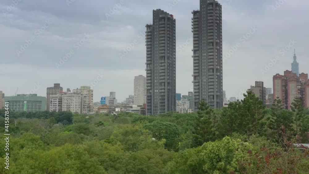 cloudy day taipei city park modern apartment buildings aerial panorama 4k taiwan cloudy day taipei city park modern apartment buildings aerial panorama 4k taiwan