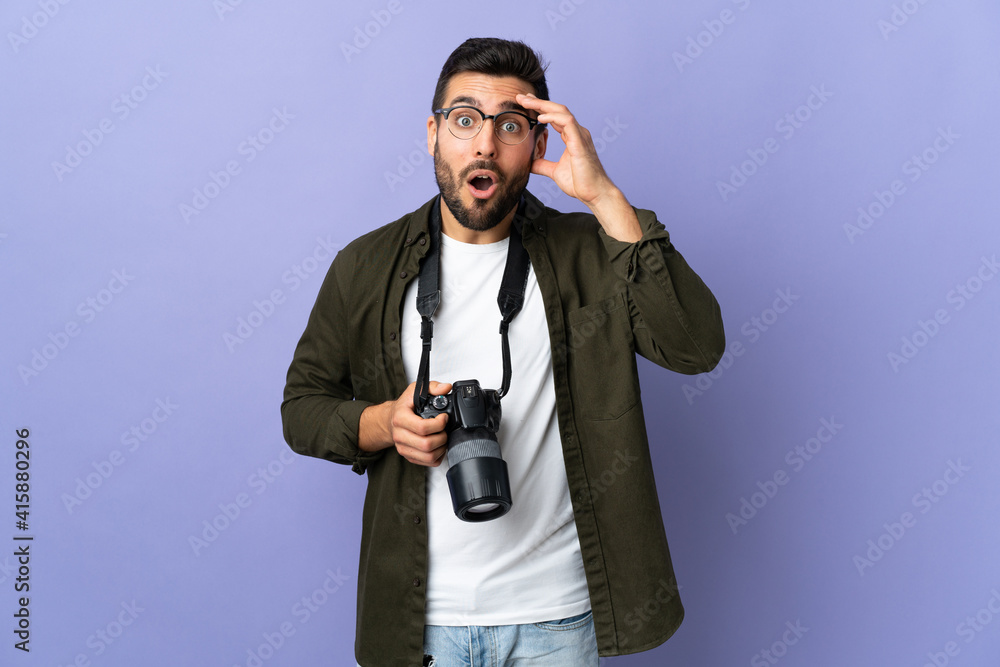 Photographer man over isolated purple background has realized something and intending the solution Photographer man over isolated purple background has realized something and intending the solution