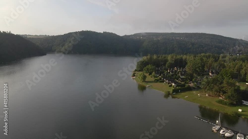 Beautiful River rapids in the fog in the morning. River water landscape. Flying from the drone through the morning fog over the river. Beautiful landscape. Forest river flow
