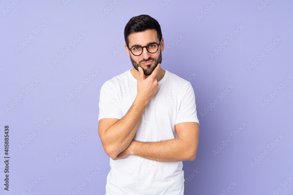 Caucasian handsome man over isolated background thinking Caucasian handsome man over isolated background thinking