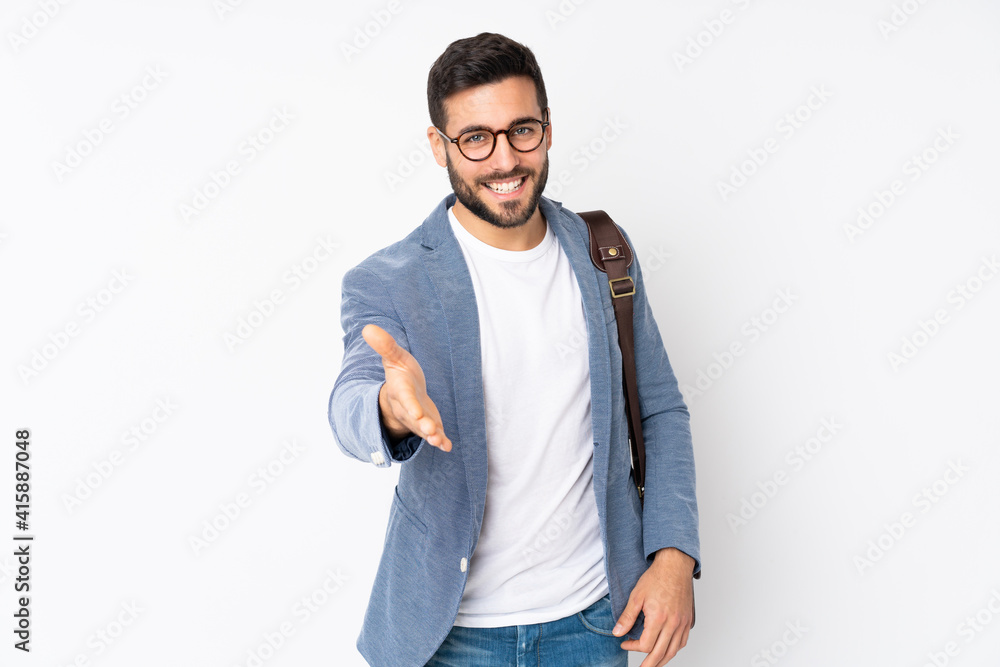 Caucasian business man isolated on white background handshaking after good deal Caucasian business man isolated on white background handshaking after good deal