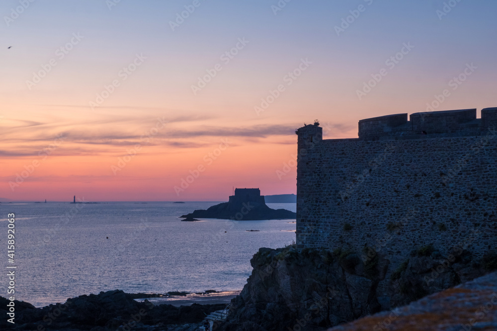 View at sunset from the wall of the old city of Saint-Malo in Brittany, France