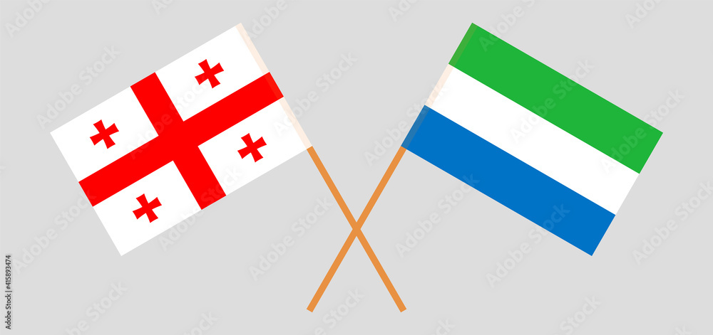 Crossed flags of Georgia and Sierra Leone. Official colors. Correct proportion
