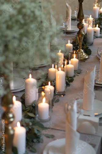 atmosphere candles at romantic wedding dinner
