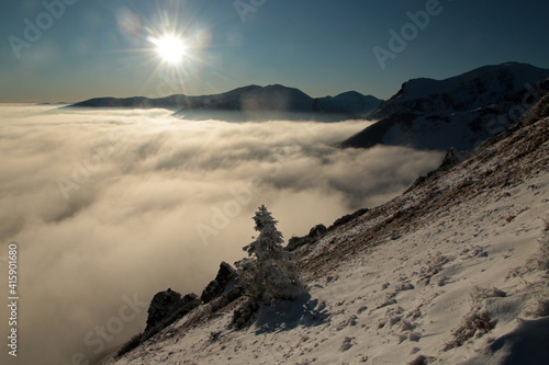 Czerwone Wierchy - Red Peaks above clouds, mountain range in Western Tatras, Poland 