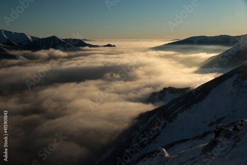 Czerwone Wierchy - Red Peaks above clouds, mountain range in Western Tatras, Poland 