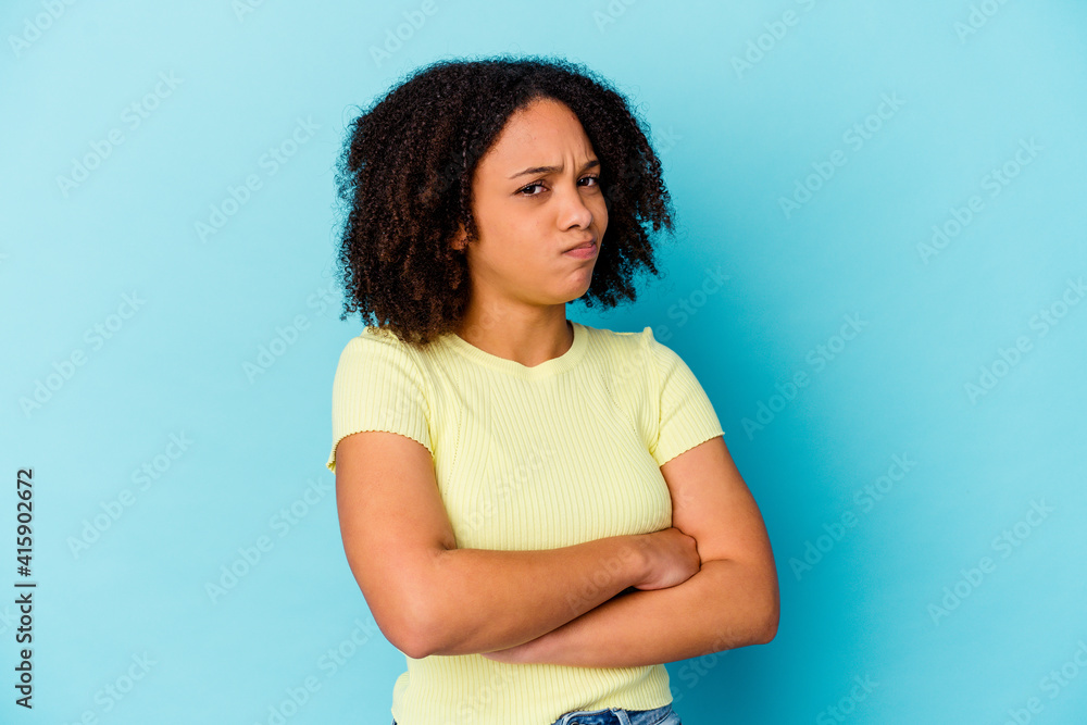 Young african american mixed race woman isolated unhappy looking in camera with sarcastic expression. Young african american mixed race woman isolated unhappy looking in camera with sarcastic expression.