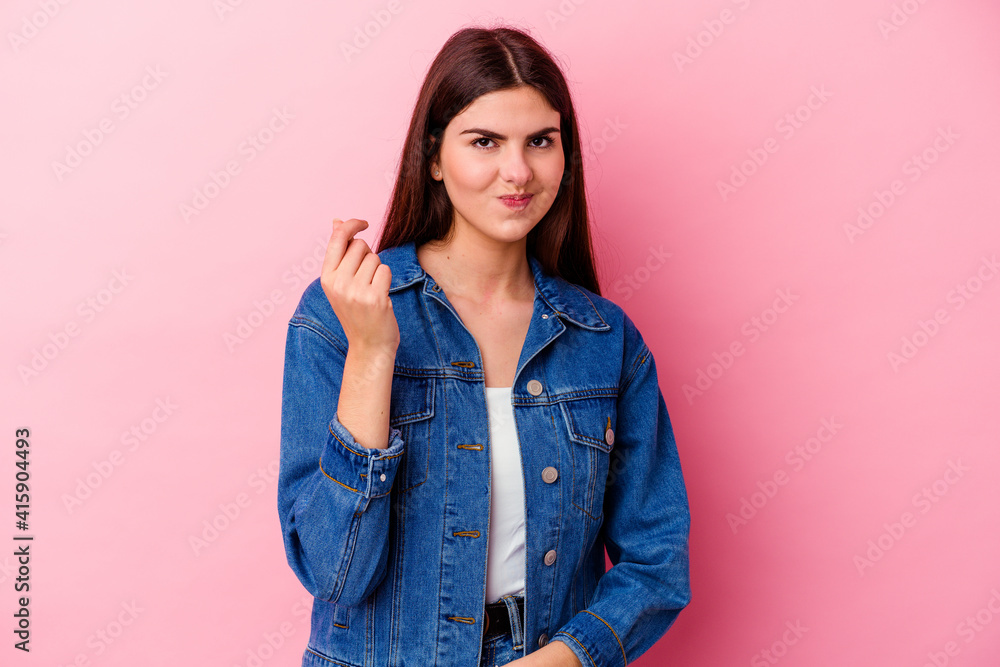 Young caucasian woman isolated on pink background showing that she has no money.