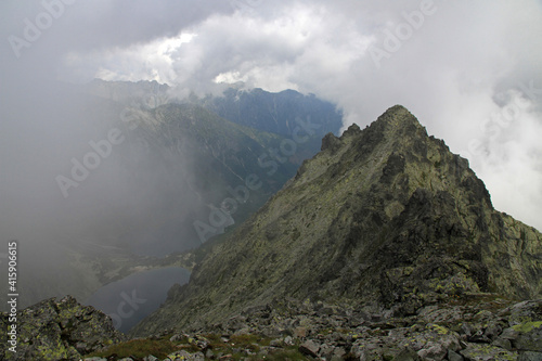 Mountain lakes of Czarny Staw pod Rysami and Morskie Oko seen from Poland's highest point, the north-western summit of Rysy, 2,499 metres (8,199 ft) in elevation. photo