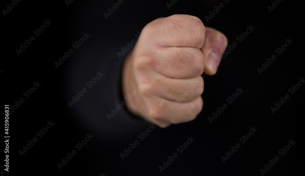close up hand of a man. a strong punch
