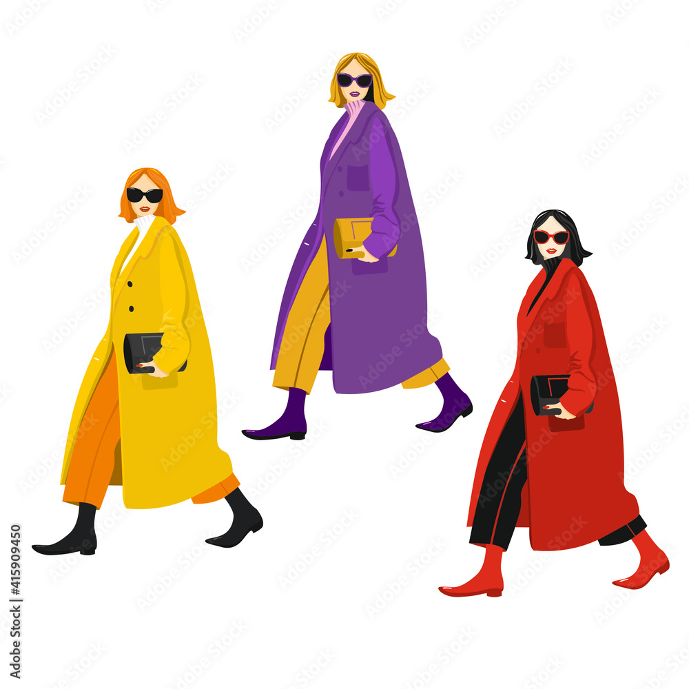 Young fashion girls in a coat with a handbag